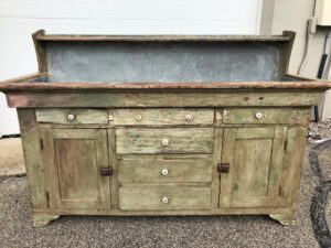 Antique green distressed wooden washstand with drawers