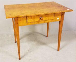 Small wooden table with single drawer