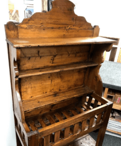 Antique rustic wooden wall shelf with slatted compartment