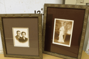 Two vintage framed sepia wedding portraits