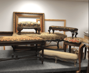 Antique upholstered footstools and ornate frames