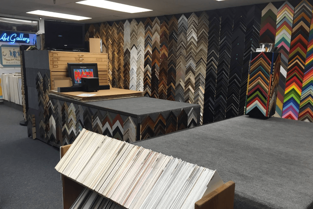 Picture frame shop interior with sample frames