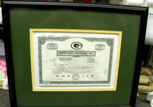 Framed Green Bay Packers stock certificate