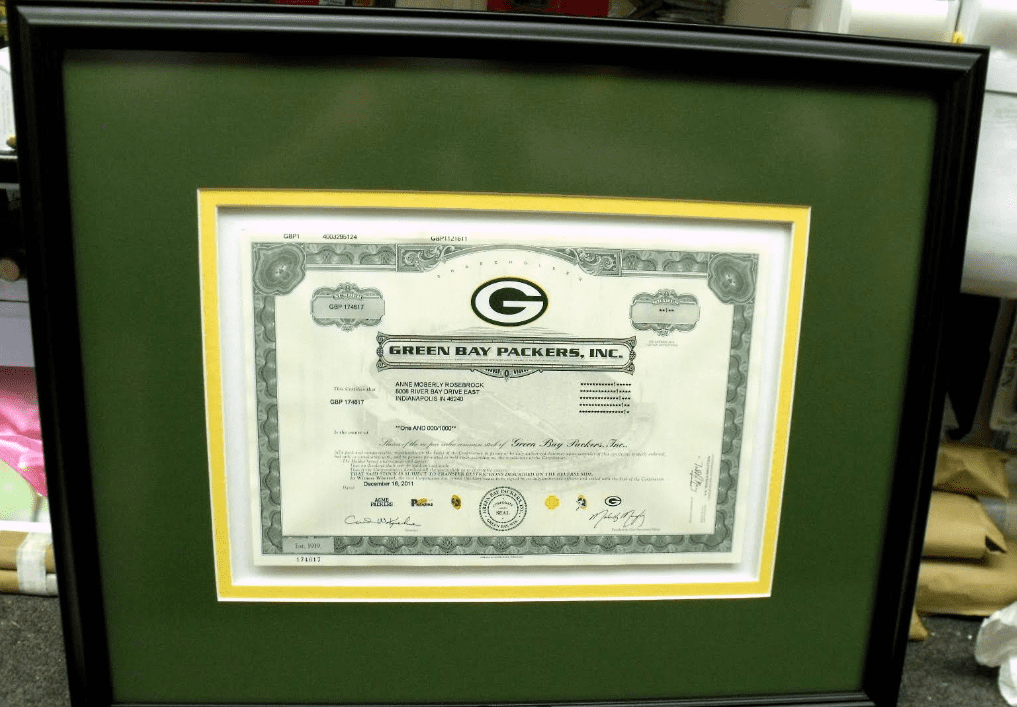 Framed Green Bay Packers stock certificate