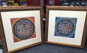 Two ornate framed mandala paintings