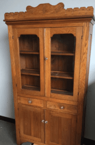 Vintage oak display cabinet with glass doors