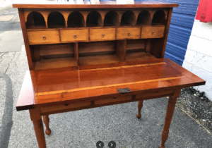 Vintage wooden drop-front desk with pigeonholes
