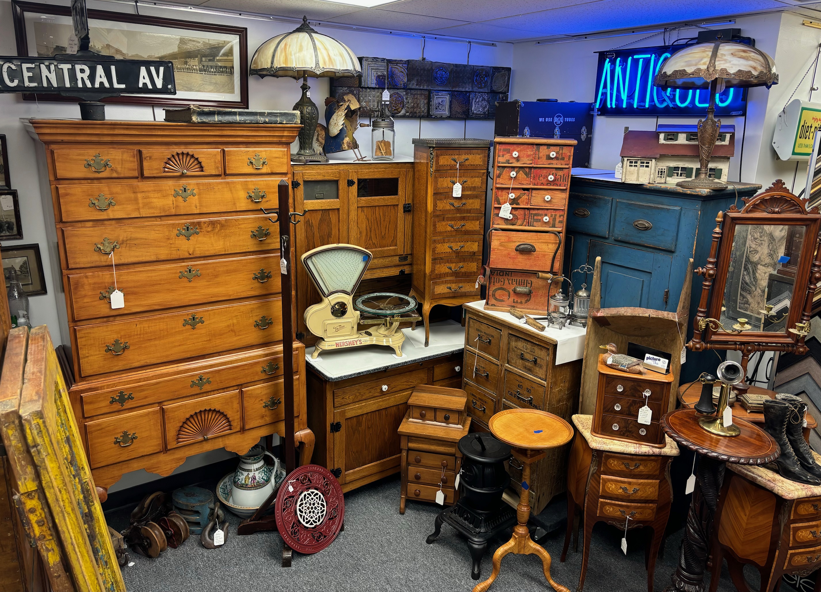 Antique store displaying wooden furniture and decor
