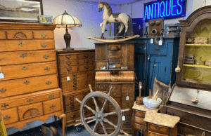 Antique shop display with wooden furniture