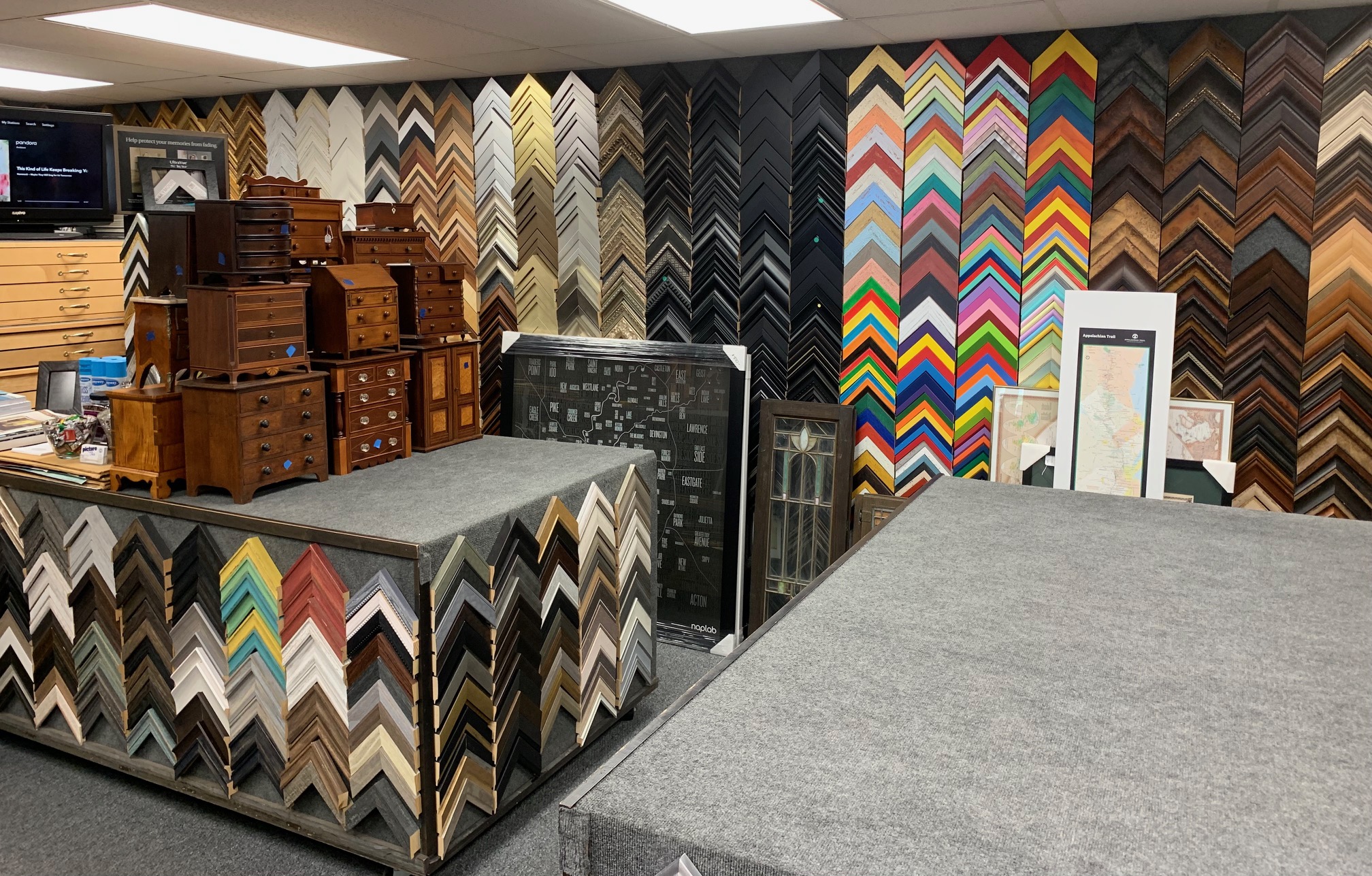 Picture frame shop interior with frame samples
